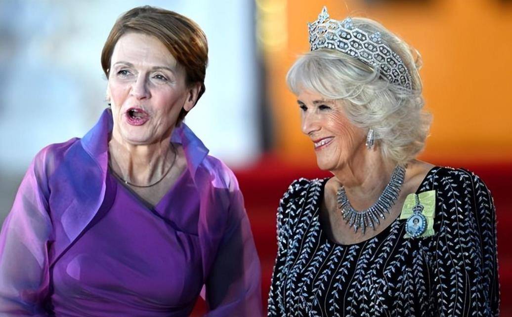 皇冠代理登3平台_德国第一夫人厉害了!穿高贵紫裙接卡米拉皇冠代理登3平台,不戴王冠也能美