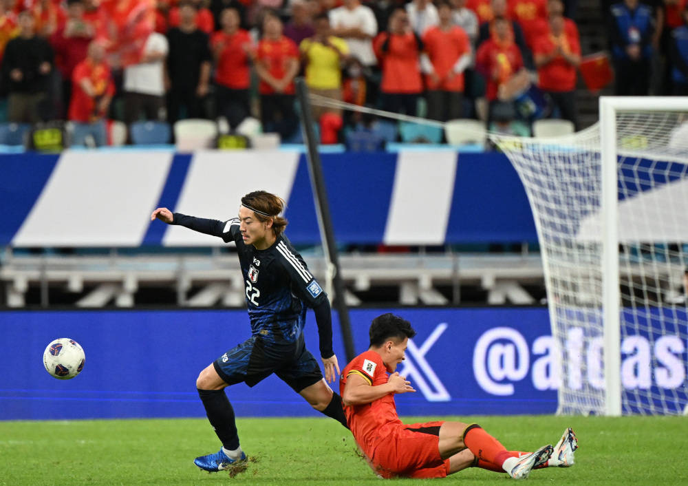 皇冠信用盘在哪里开通_国足扳回一球1-2日本!谢文能连过两人皇冠信用盘在哪里开通,韦世豪助攻林良铭破门!